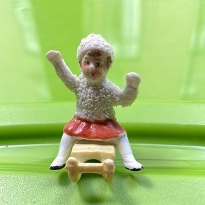 One of the very rare bisque snowbabies from the early 1900’s - German stamp